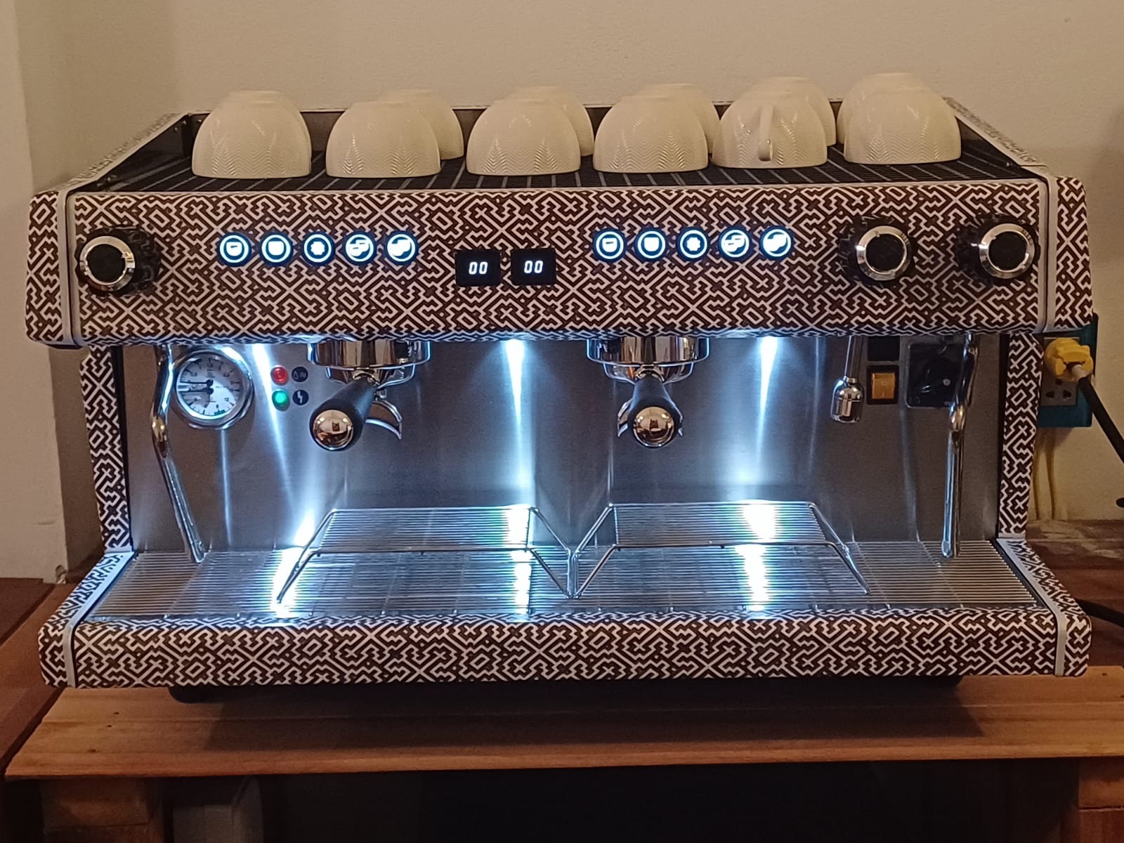 The bright lights of the cafe's espresso machine, one of the few in the Amazon. 