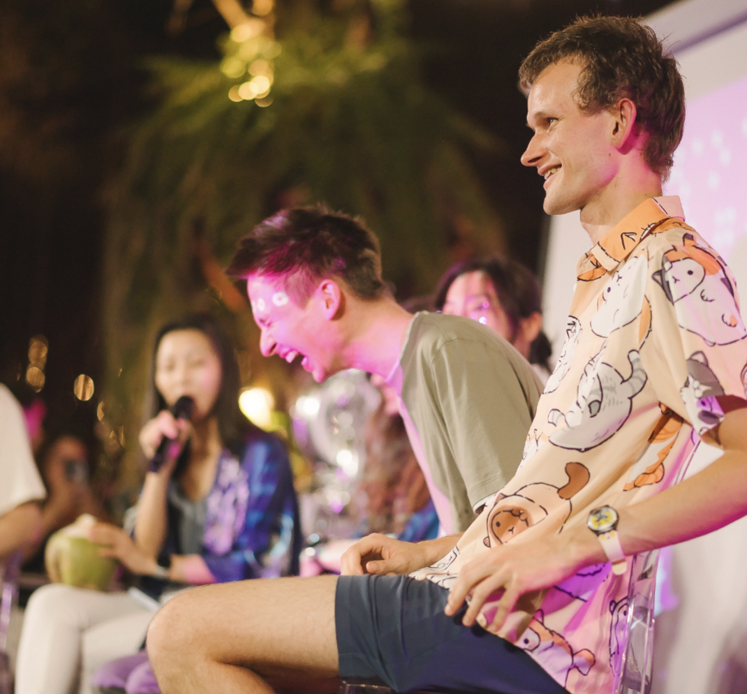 Karl Floersch and Vitalik Buterin share a panel with friends at Uniday's Ethereum Decentralization Night. 