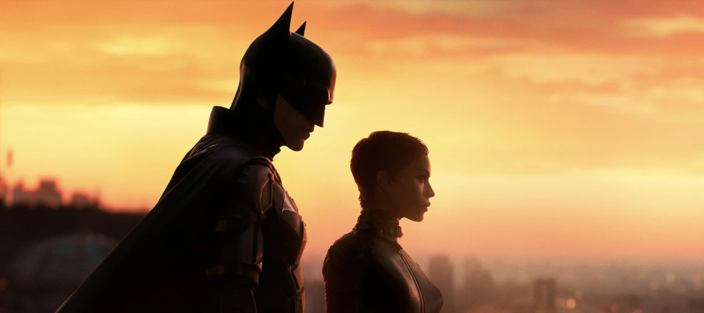 Alt: Batman and Catwoman on top of a building