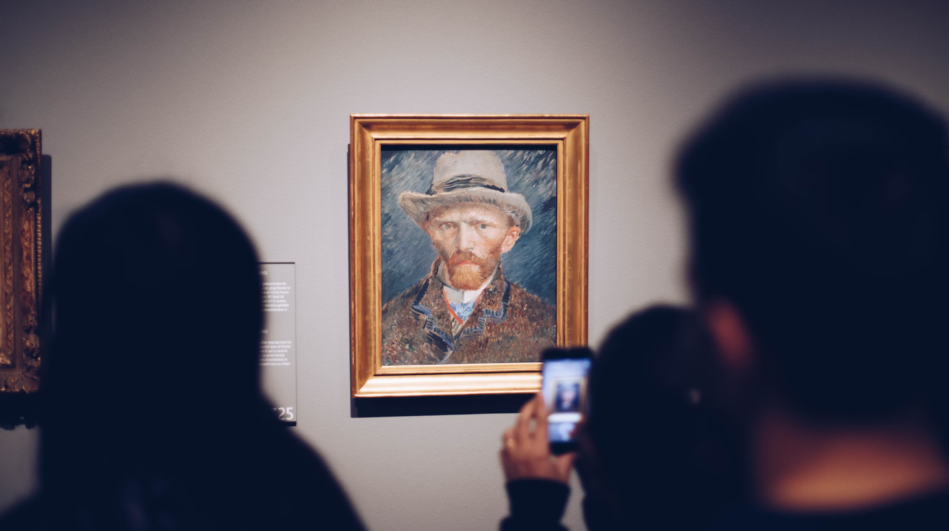 People around the artworks