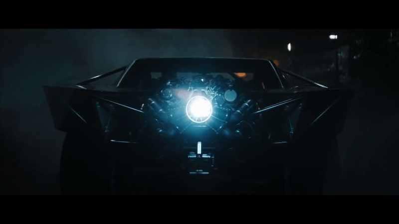 Alt: Batman's car blowing flames from its back
