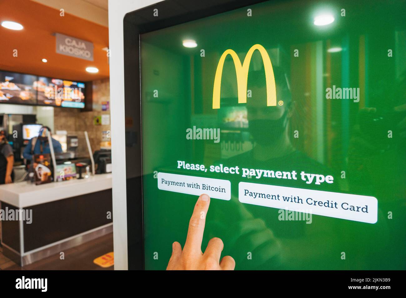 https://www.alamy.com/a-person-pays-for-their-food-with-bitcoin-over-the-lightning-network-on-a-mcdonalds-ordering-kiosk-in-el-salvador-image476822011.html